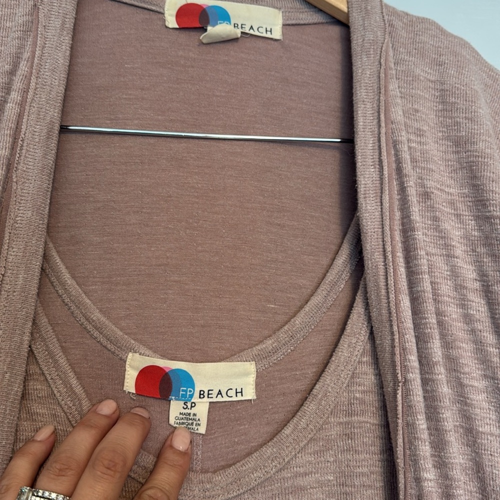 Free people beach set
Tank jumpsuit with matching duster - Picture 2 of 4